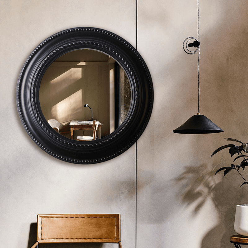 Black decorative round mirror