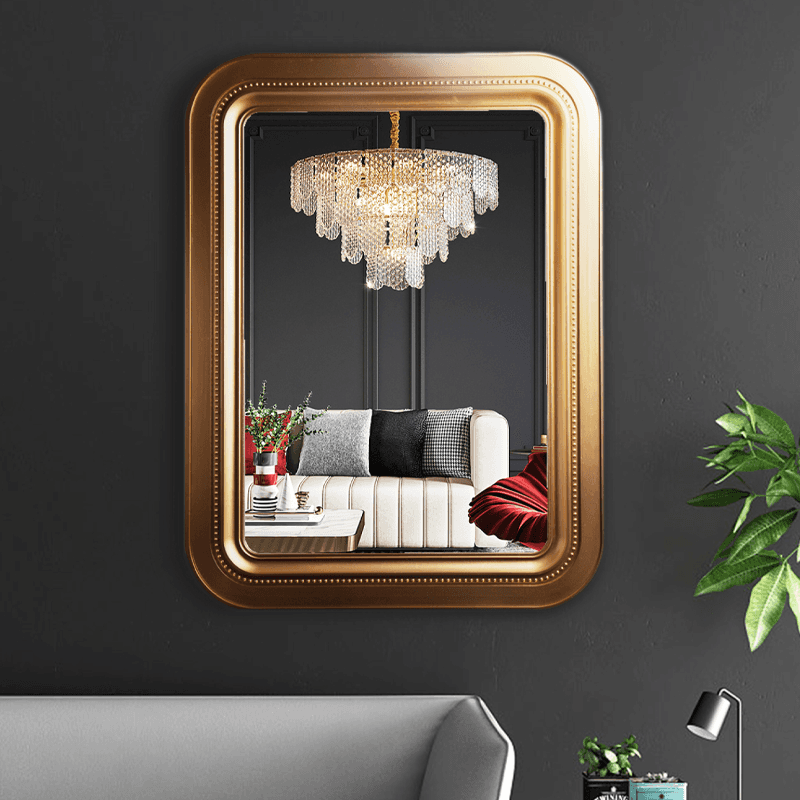 Gold framed modern mirror with rounded corner