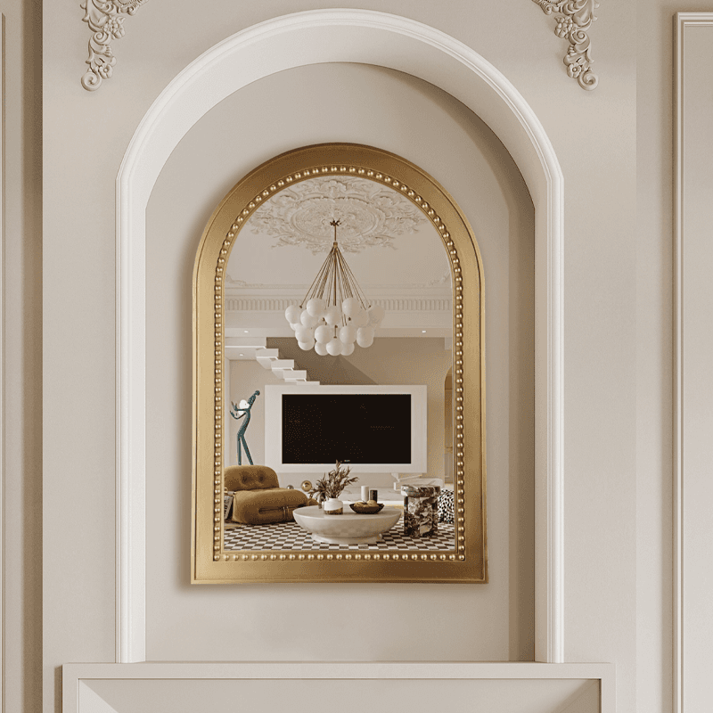 Gold framed arched modern wall mirror